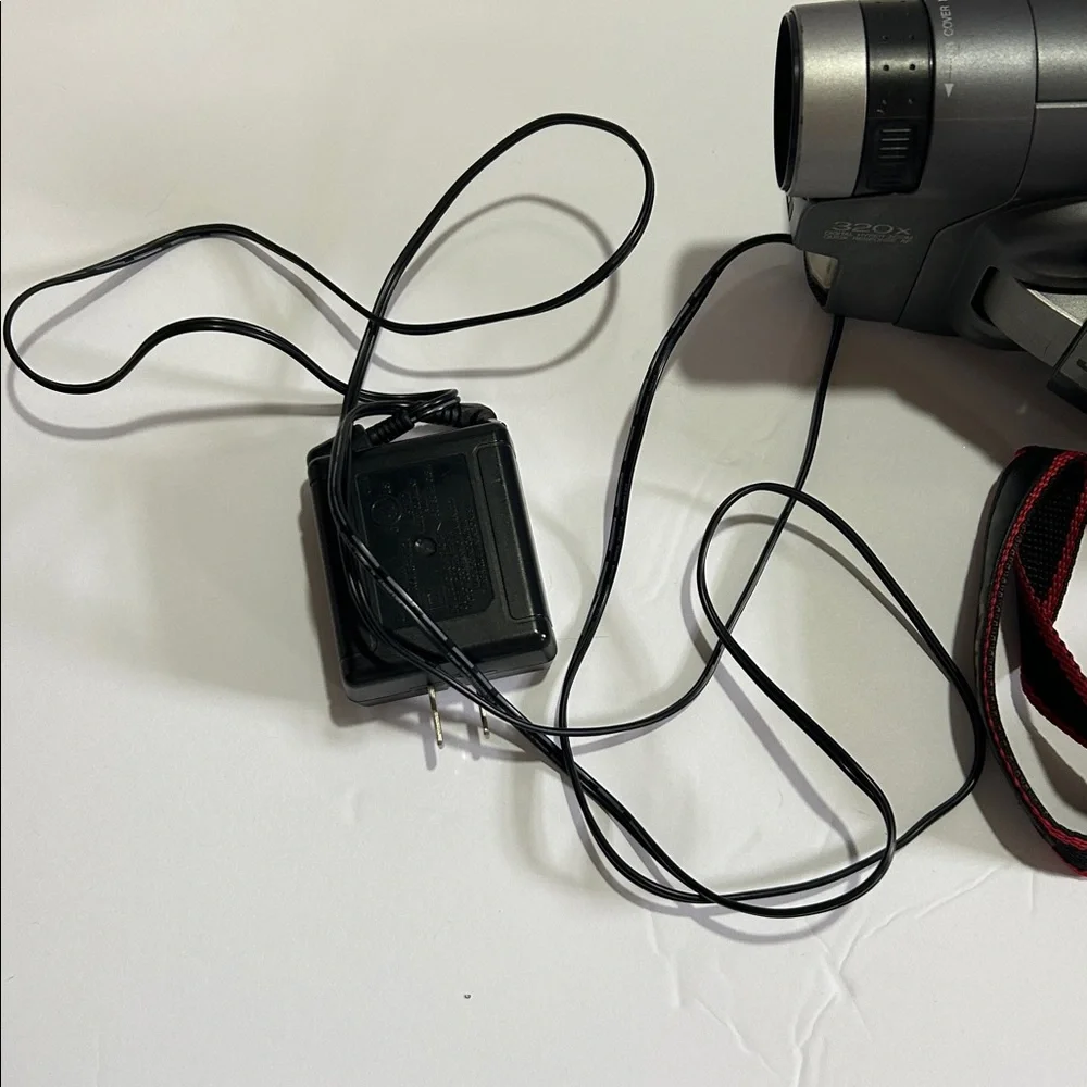 Compact VHS Camcorder in Gray with Red/Black Strap